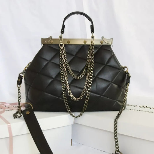 French vintage black patchwork hand bag , quilted leather, golden frame