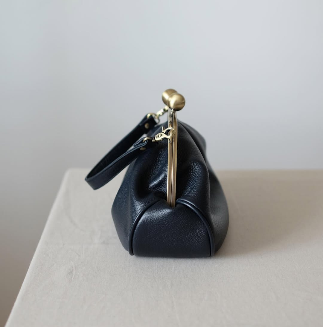 Medium version of a bag with a clasp