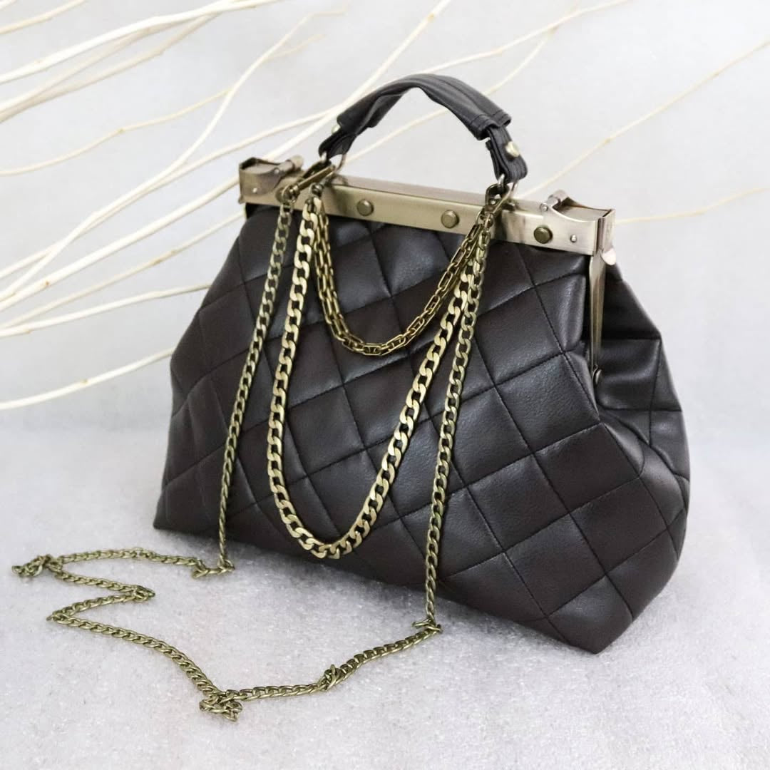 French vintage black patchwork hand bag , quilted leather, golden frame