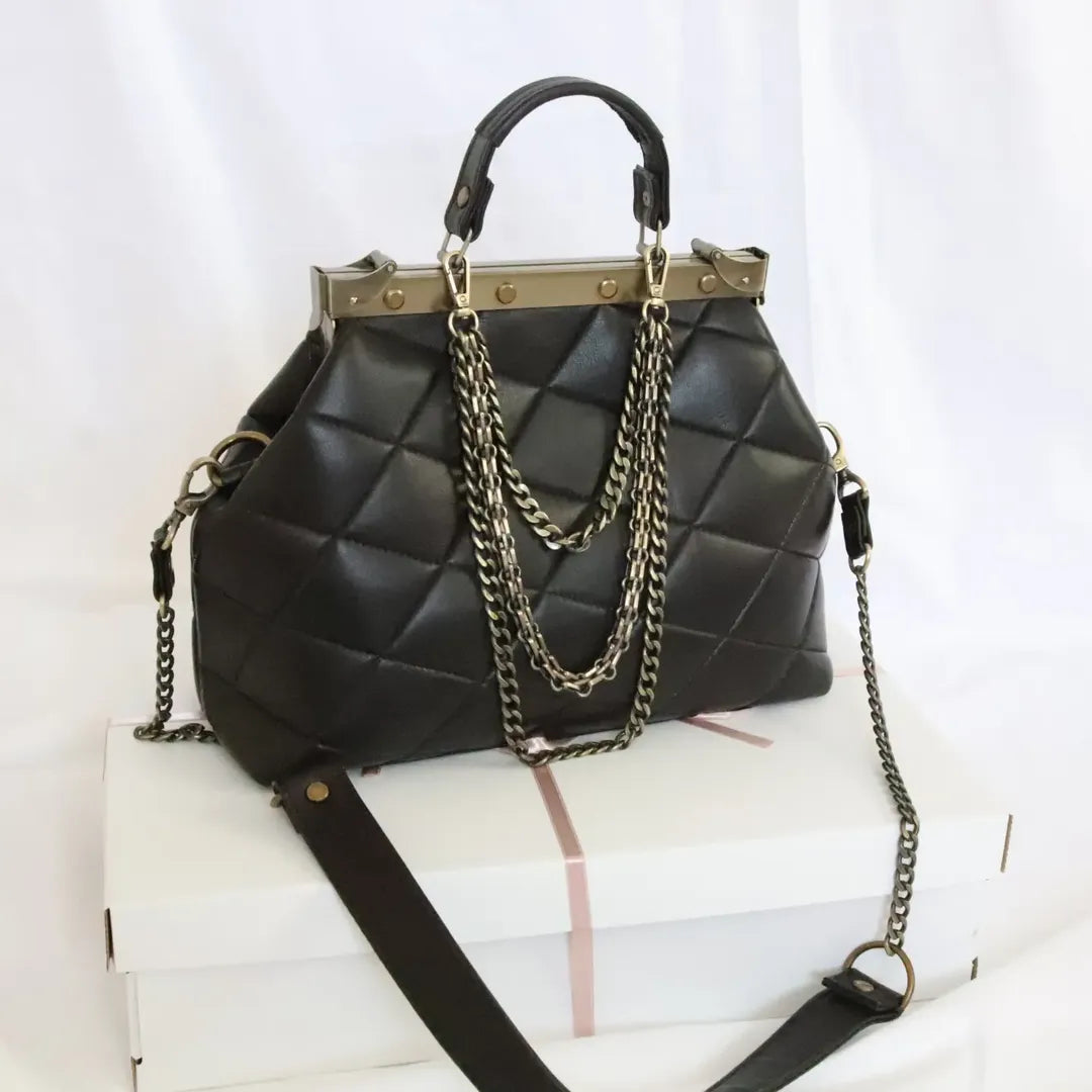 French vintage black patchwork hand bag , quilted leather, golden frame