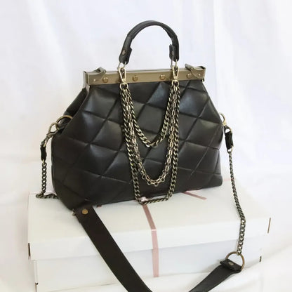 French vintage black patchwork hand bag , quilted leather, golden frame