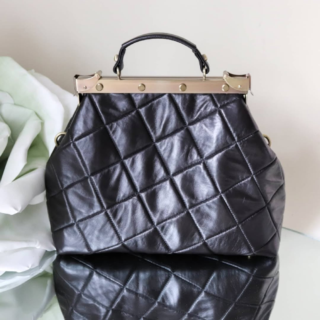 French vintage black patchwork hand bag , quilted leather, golden frame