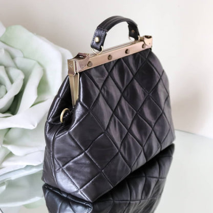 French vintage black patchwork hand bag , quilted leather, golden frame